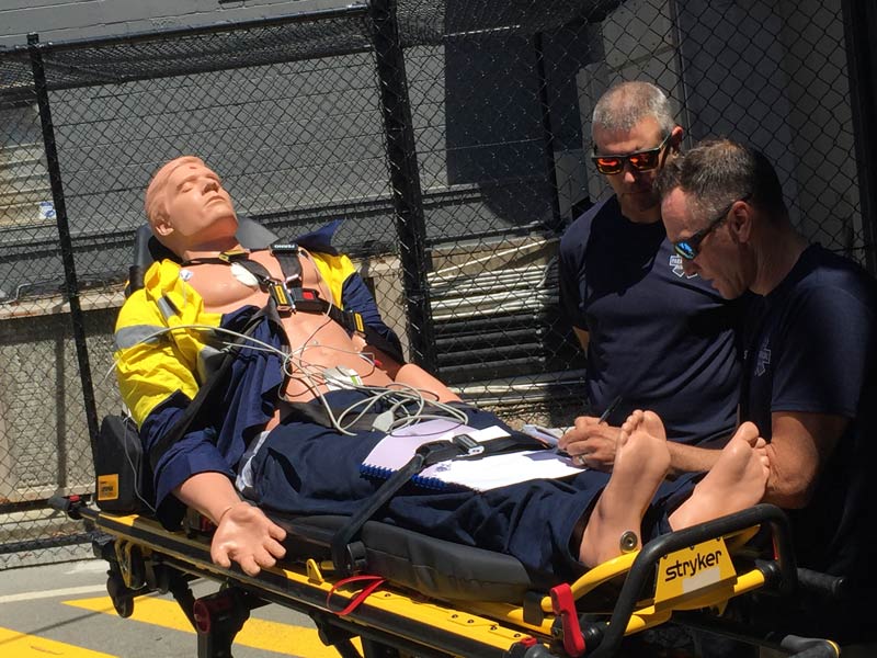 Casual Positions Available - Paramedics Jobs NSW-Australian Paramedical College patient loading into ambulance student paramedics in training